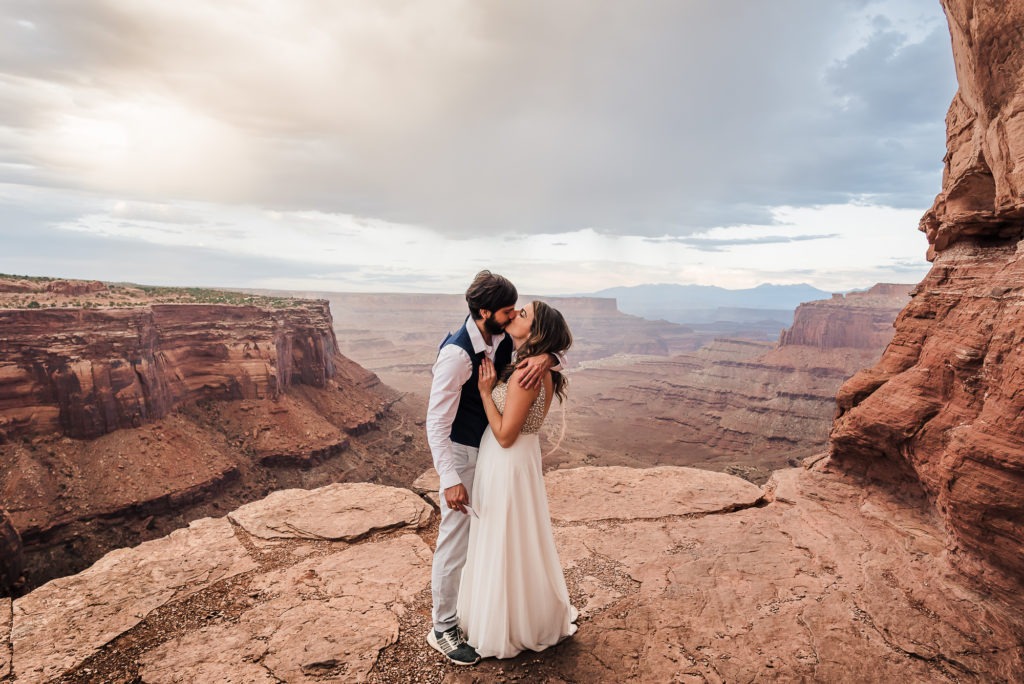 Elopement ceremony with a dramatic Canyonlands, Moab, Utah view.