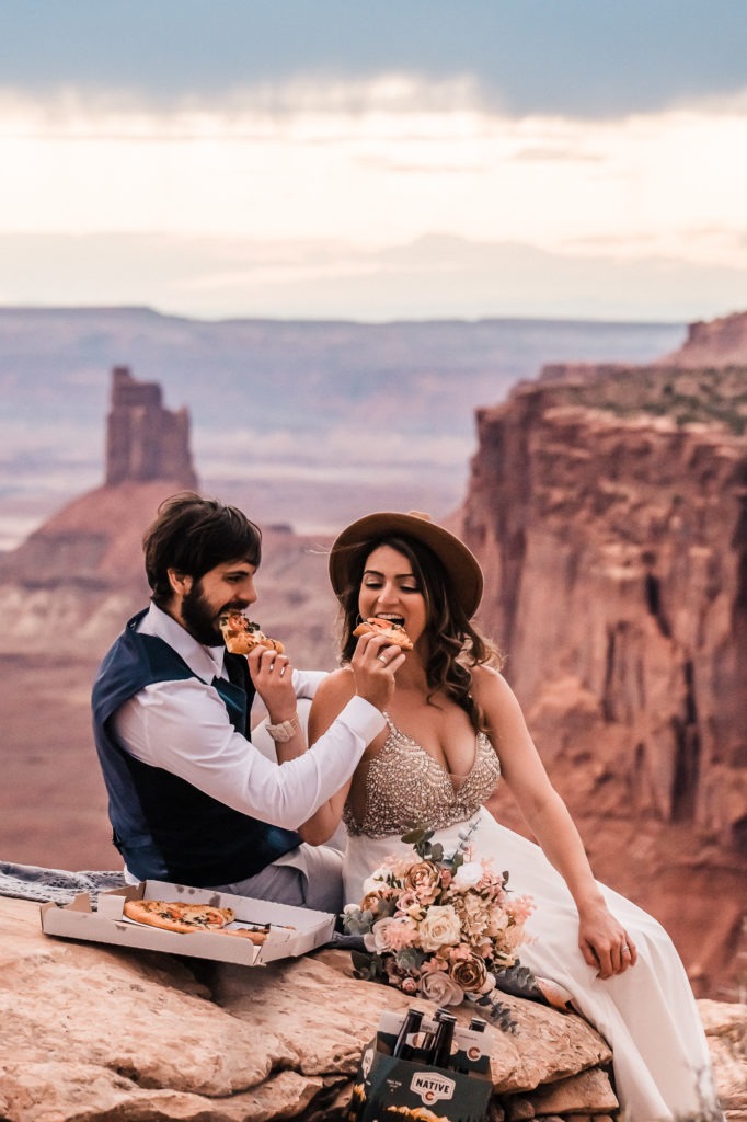 Epic elopement idea: pizza and beers at sunset!