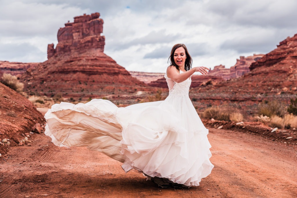 Flowy dress to the extreme! The bride spins and the layers upon layers of her dress swoosh in the breeze.
