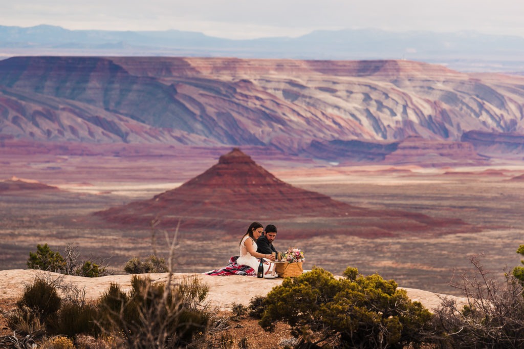 Elopement ideas: share a picnic! Better yet, a picnic with a view.